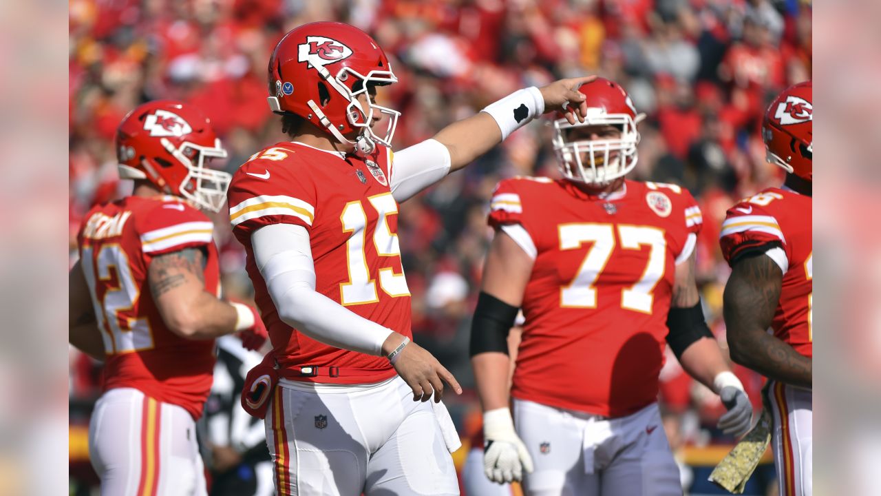 Kansas City Chiefs quarterback Patrick Mahomes (15) celebrates with tight  end Travis Kelce (87) after throwing a 67-yard touchdown pass to Tyreek  Hill during the first quarter of an NFL football game