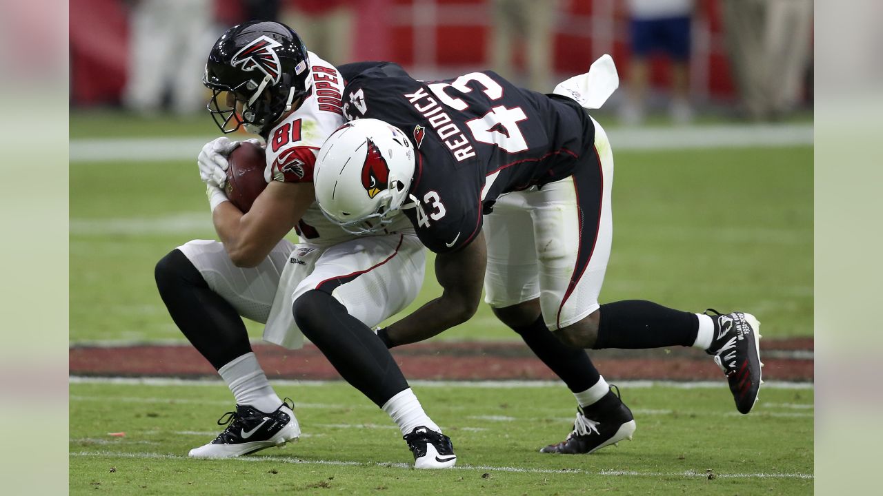 Atlanta Falcons tight end Austin Hooper (81) scores a touchdown as Arizona  Cardinals outside linebacker Haason Reddick (43) pursues during the second  half of an NFL football game, Sunday, Oct. 13, 2019