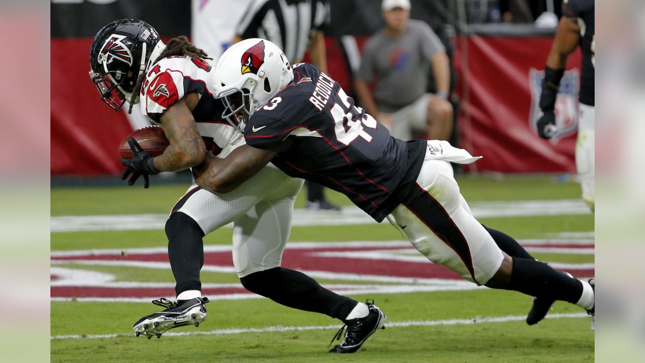 Atlanta Falcons tight end Austin Hooper (81) scores a touchdown as Arizona  Cardinals outside linebacker Haason Reddick (43) pursues during the second  half of an NFL football game, Sunday, Oct. 13, 2019