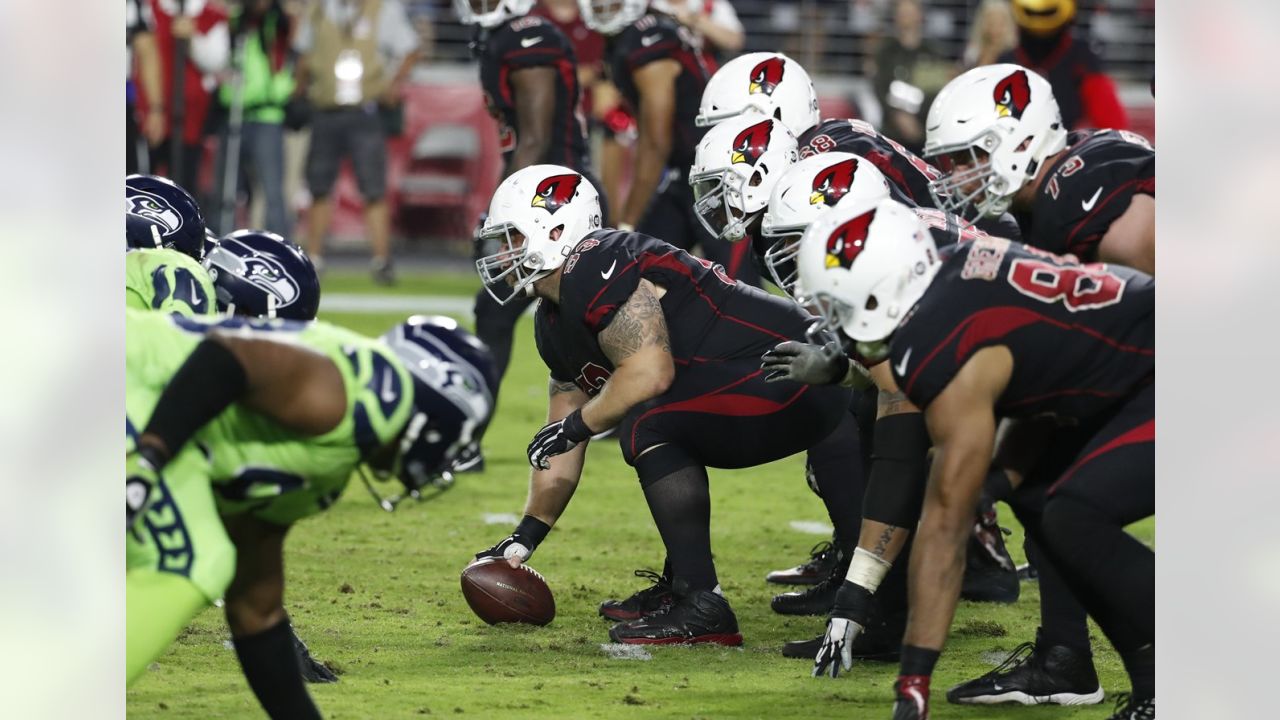 Cardinals' D.J. Humphries, Tyvon Branch leave game with knee injuries