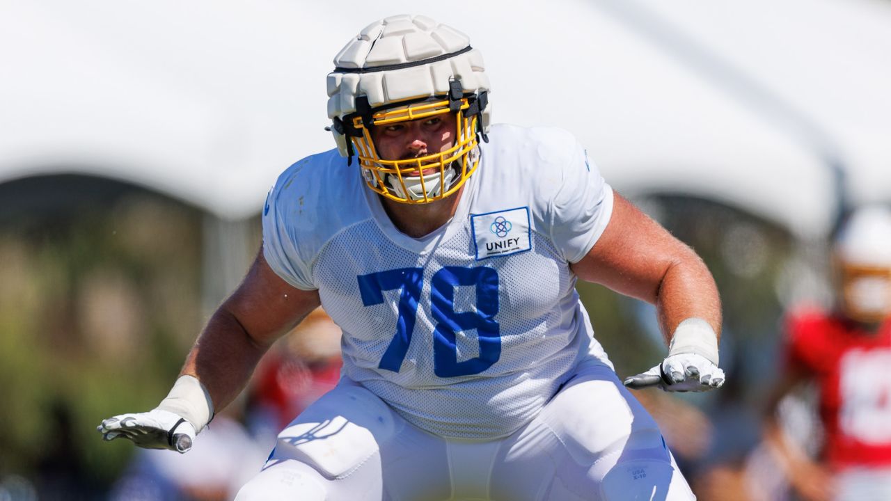 INDIANAPOLIS, IN - DECEMBER 26: Los Angeles Chargers offensive tackle Trey  Pipkins III (79) walks of