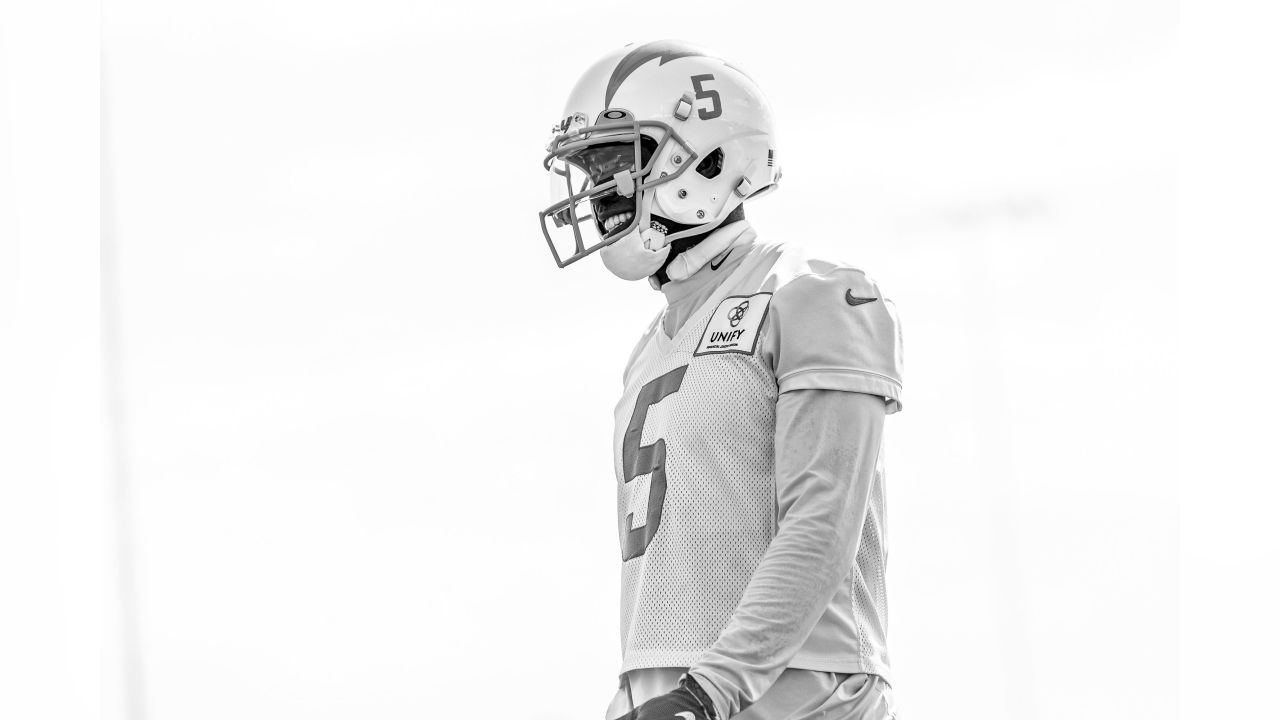 Los Angeles Chargers quarterback Justin Herbert (10) works on a drill  during practice at the NFL football team's training camp in Costa Mesa,  Calif., Saturday, July 31, 2021. (AP Photo/Alex Gallardo Stock