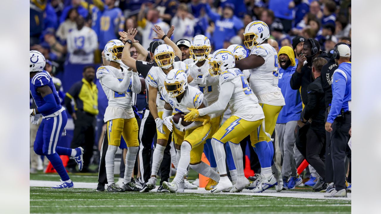 December 26, 2022: Indianapolis Colts cornerback Dallis Flowers (33) runs  with the ball against the Los Angeles Chargers in Indianapolis, Indiana.  John Mersits/CSM/Sipa USA.(Credit Image: © John Mersits/Cal Sport  Media/Sipa USA Stock