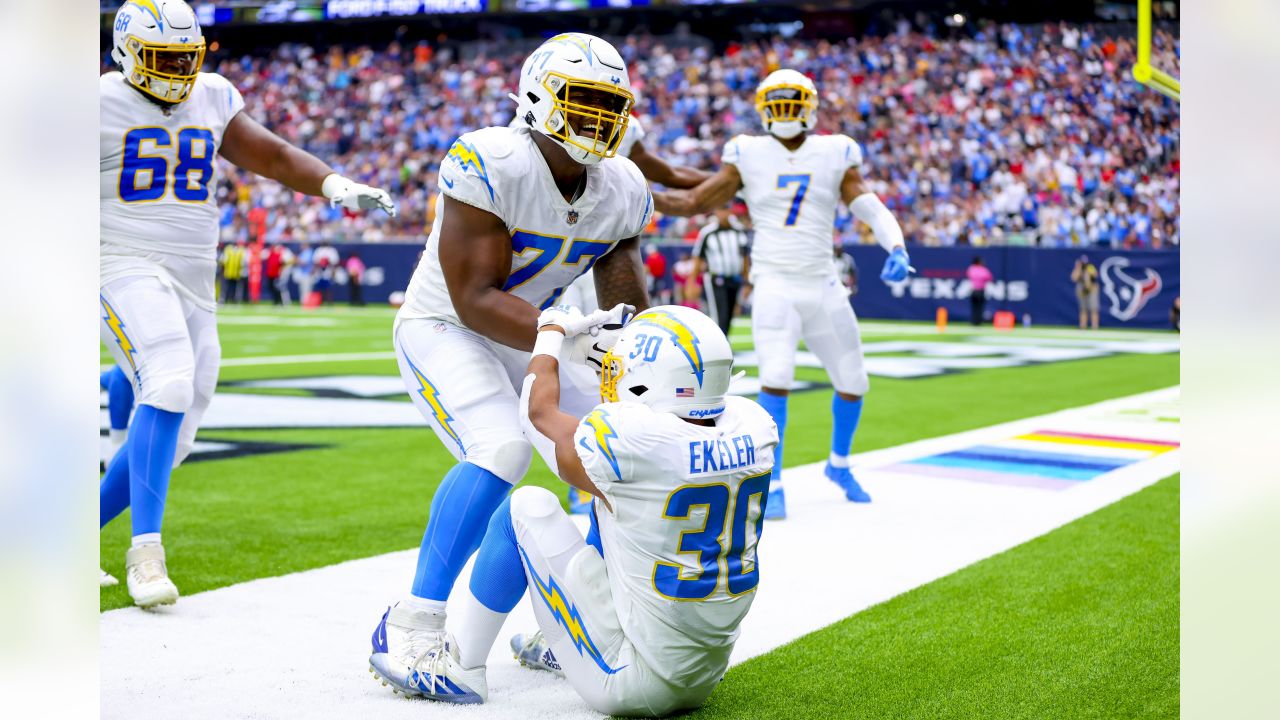 Los Angeles Chargers tight end Tre' McKitty (88) wears a Jamaica flag  sticker on his helmet before an NFL football game against the Houston  Texans, Sunday, Oct. 2, 2022, in Houston. (AP