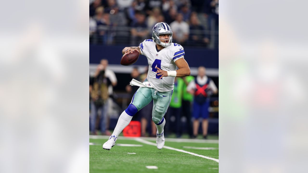 Dallas Cowboys quarterback Dak Prescott (4) looks to pass during a Thanksgiving  day NFL football game against the Las Vegas Raiders, Thursday, Nov. 25,  2021, in Arlington, Texas. (AP Photo/Matt Patterson Stock