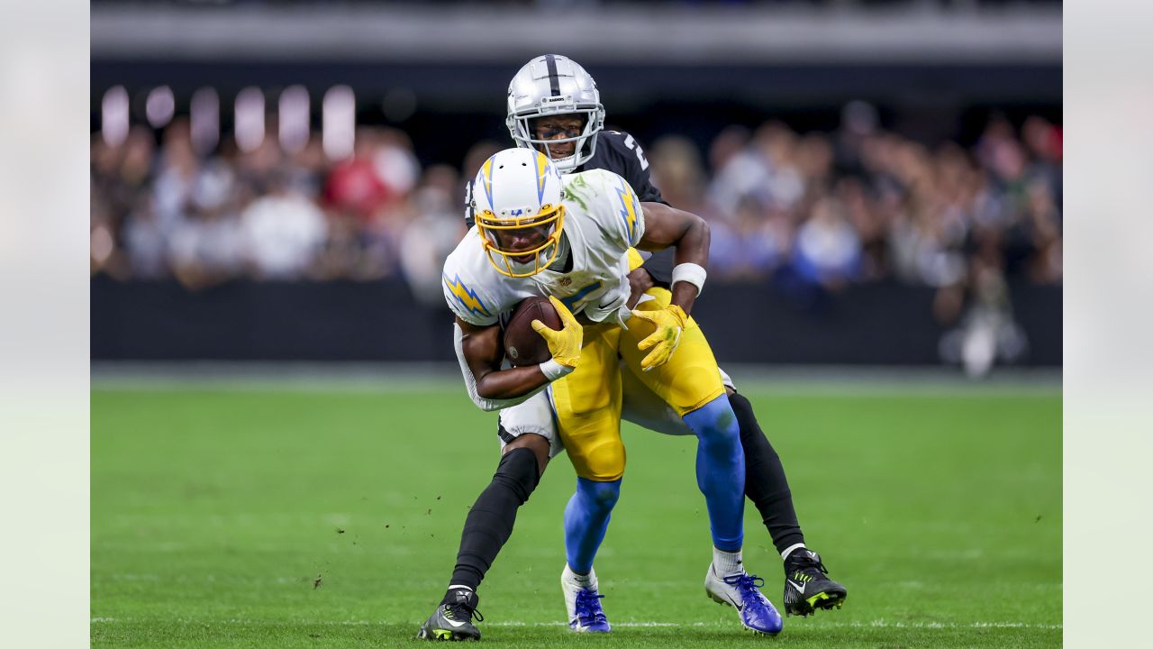 Carson councilman with split Chargers/Raiders jersey (Photo)