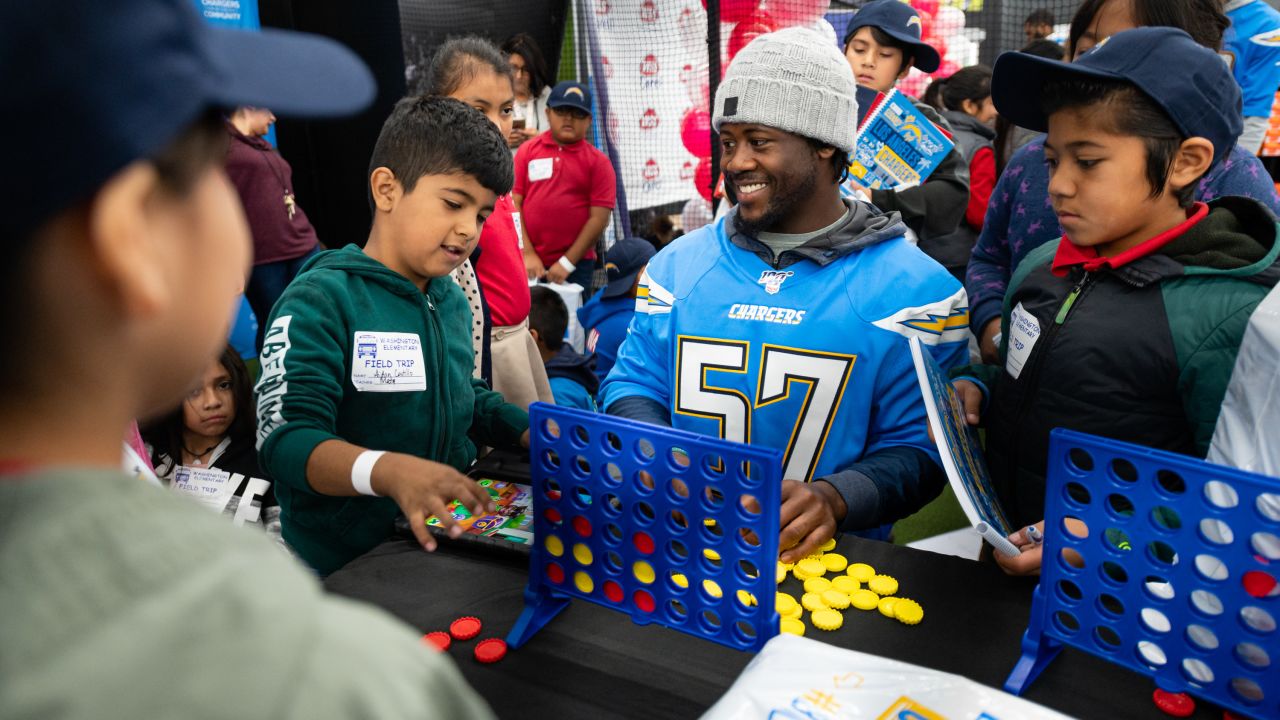 Chargers players join Santa Ana elementary school students for shoe  giveaway – Orange County Register