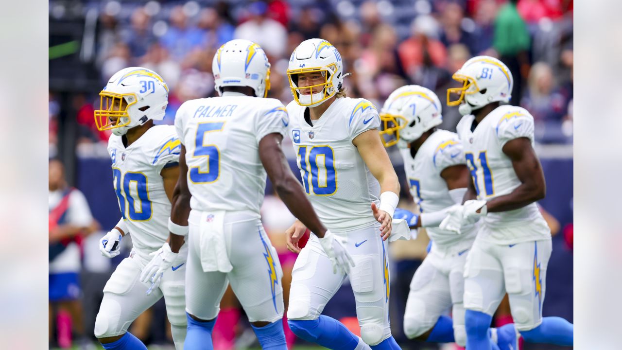 Los Angeles Chargers tight end Tre' McKitty (88) wears a Jamaica flag  sticker on his helmet before an NFL football game against the Houston  Texans, Sunday, Oct. 2, 2022, in Houston. (AP