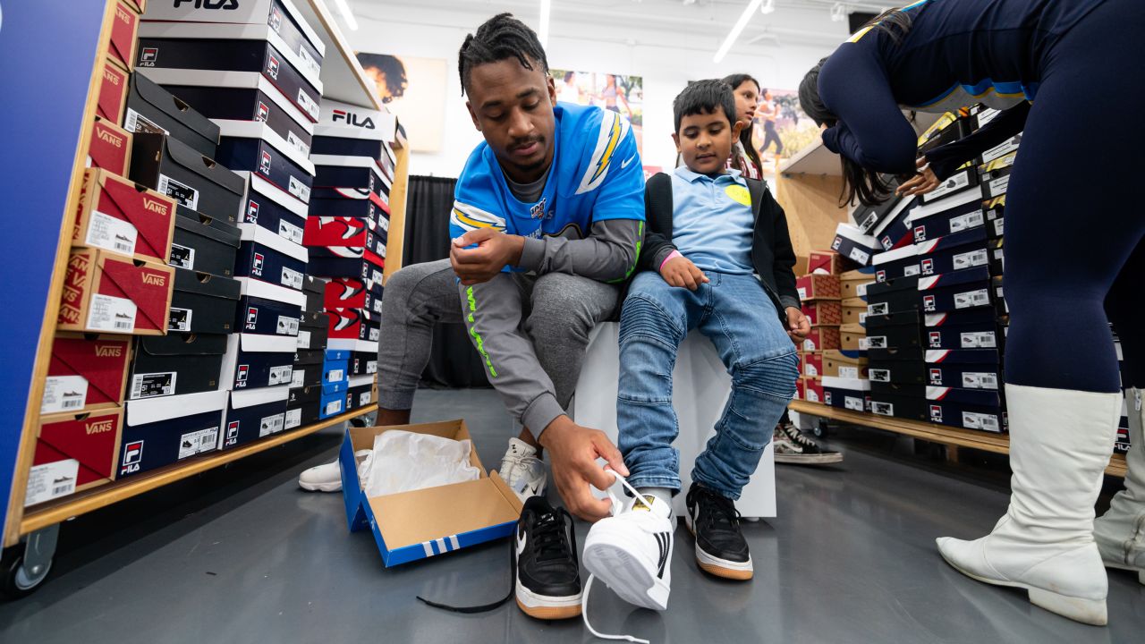 Chargers players join Santa Ana elementary school students for shoe  giveaway – Orange County Register