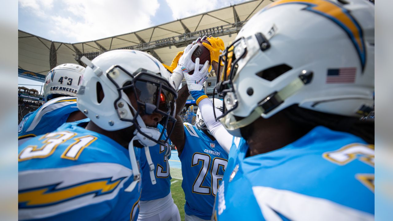 The Bolts huddle with the game ball before taking the field in the Week 5 matchup against the Oakland Raiders.