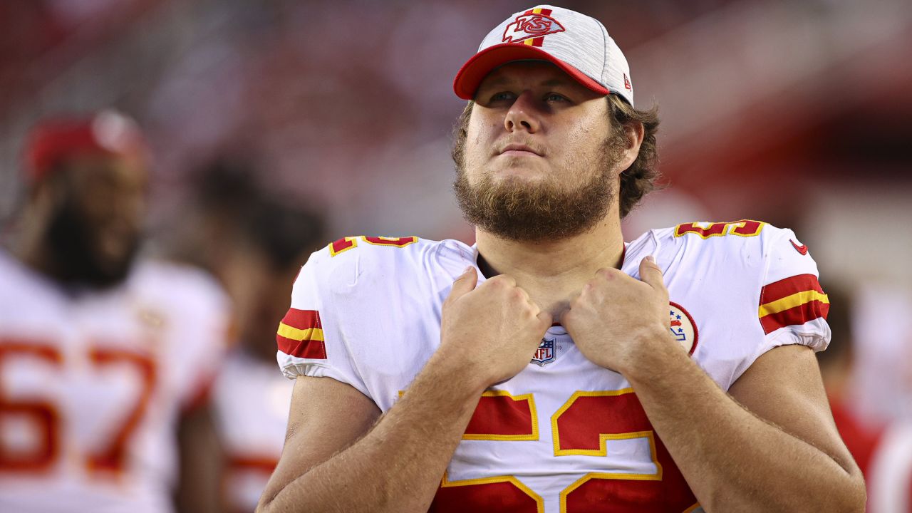 Kansas City Chiefs center Creed Humphrey (52) walks the sideline