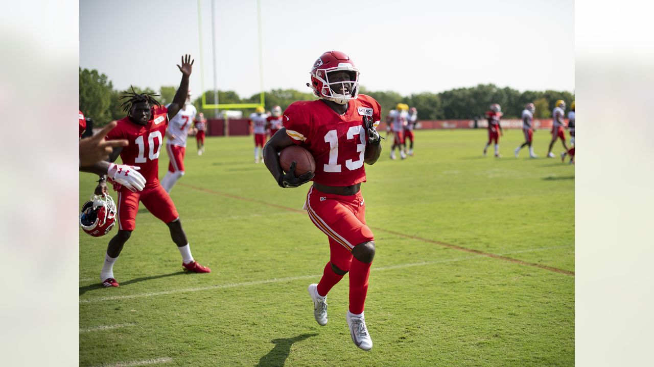 Kansas City Chiefs defensive backs coach Emmitt Thomas shares a laugh with  players during an NFL football training camp practice Tuesday, Aug. 18,  2015, in St. Joseph, Mo. (Andrew Carpenean/The St. Joseph