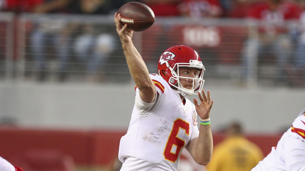 Kansas City Chiefs quarterback Shane Buechele (6) runs with the