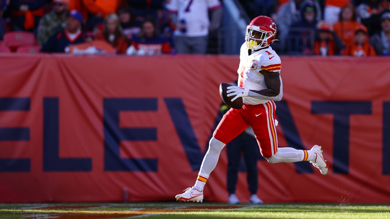 Kansas City Chiefs running back Jerick McKinnon (1) runs the ball into the end zone for a touchdown during an NFL football game against the Denver Broncos, Sunday, December 11, 2022 in Denver.