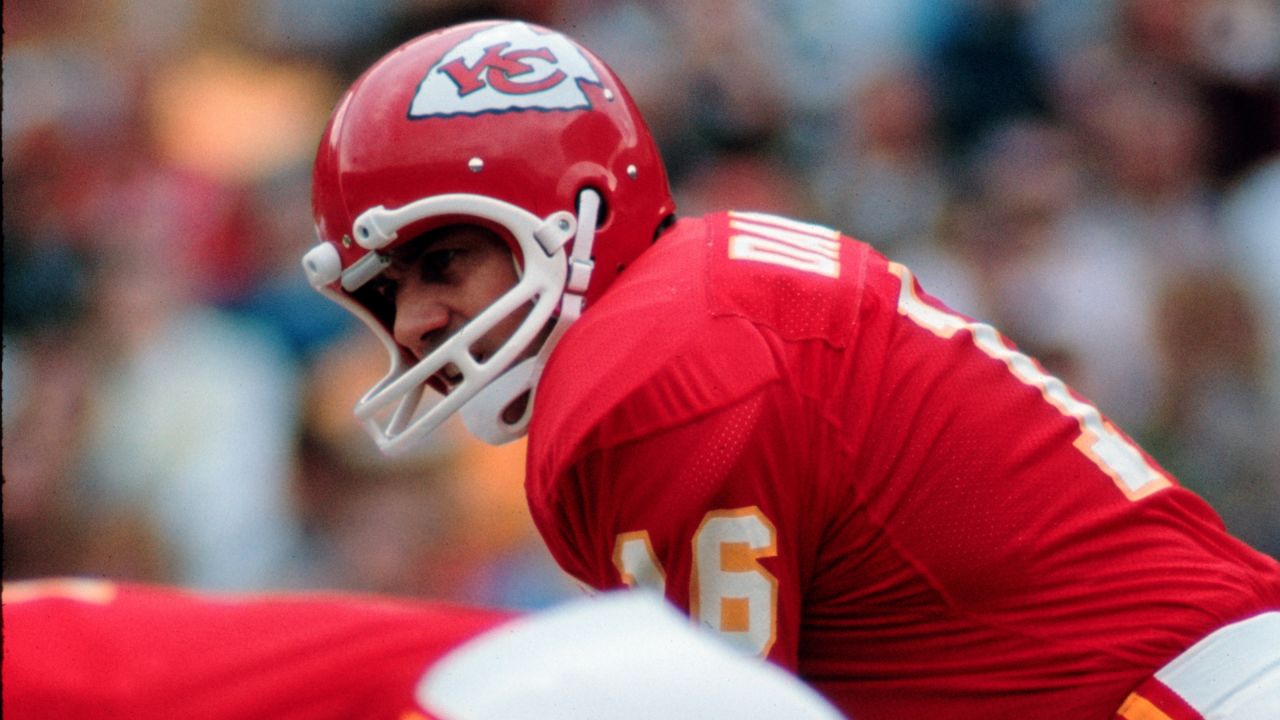 Former Kansas City Chiefs quarterback Len Dawson beats the drum