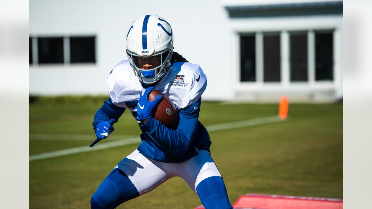 Indianapolis Colts running back D'vonte Price runs on the field