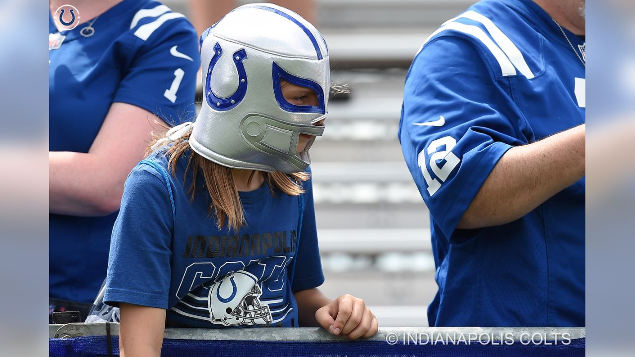 An Indianapolis Colts helmet sits on the field during NFL training