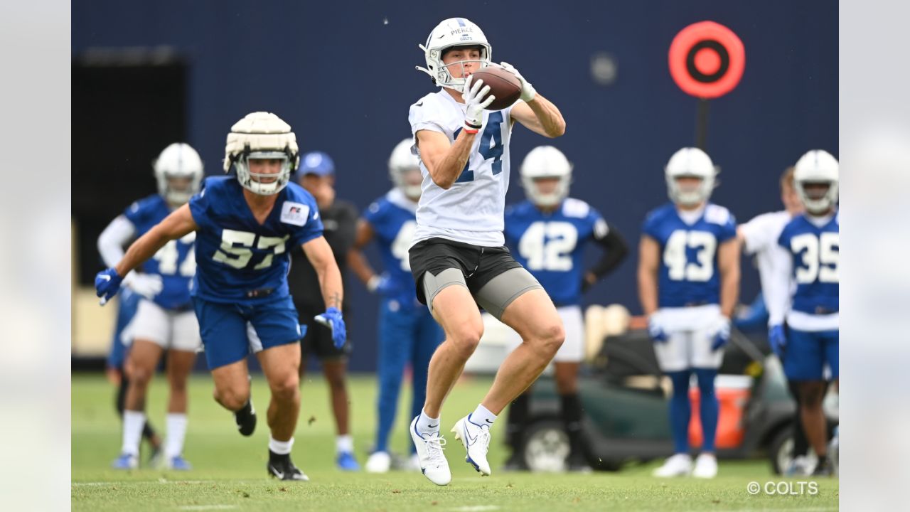 Indianapolis Colts quarterbacks, from left, Matt Ryan, Nick Foles, Sam  Ehlinger and Jack Coan drop back to throw during practice at the NFL team's  football training camp in Westfield, Ind., Thursday, July