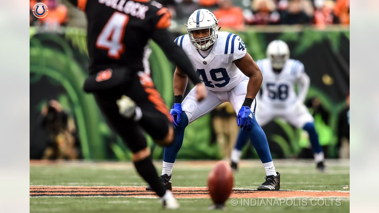 Cincinnati Bengals wide receiver Auden Tate is stopped with the ball by  Oakland Raiders cornerb …