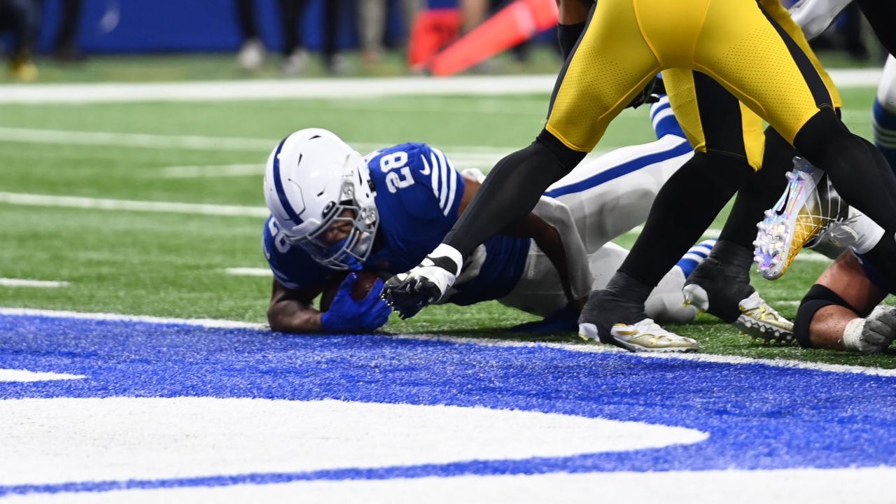 Indianapolis Colts tight end Jelani Woods (80) wears Salute to Service  stickers on his helmet before an NFL football game against the Dallas  Cowboys, Sunday, Dec. 4, 2022, in Arlington, Texas. Dallas