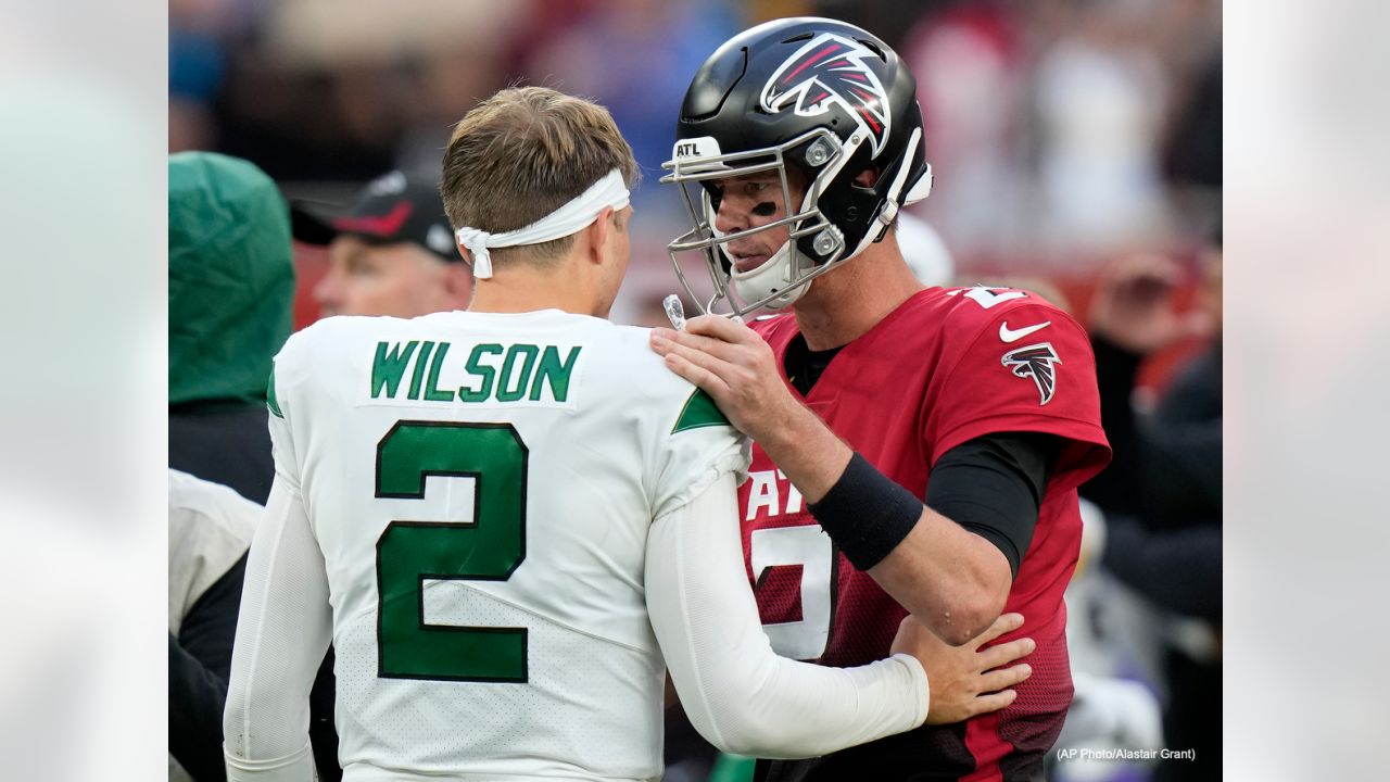 First look: Recently acquired quarterback Matt Ryan holds his new  Indianapolis Colts jersey following his trade away from the Atlanta Falcons.