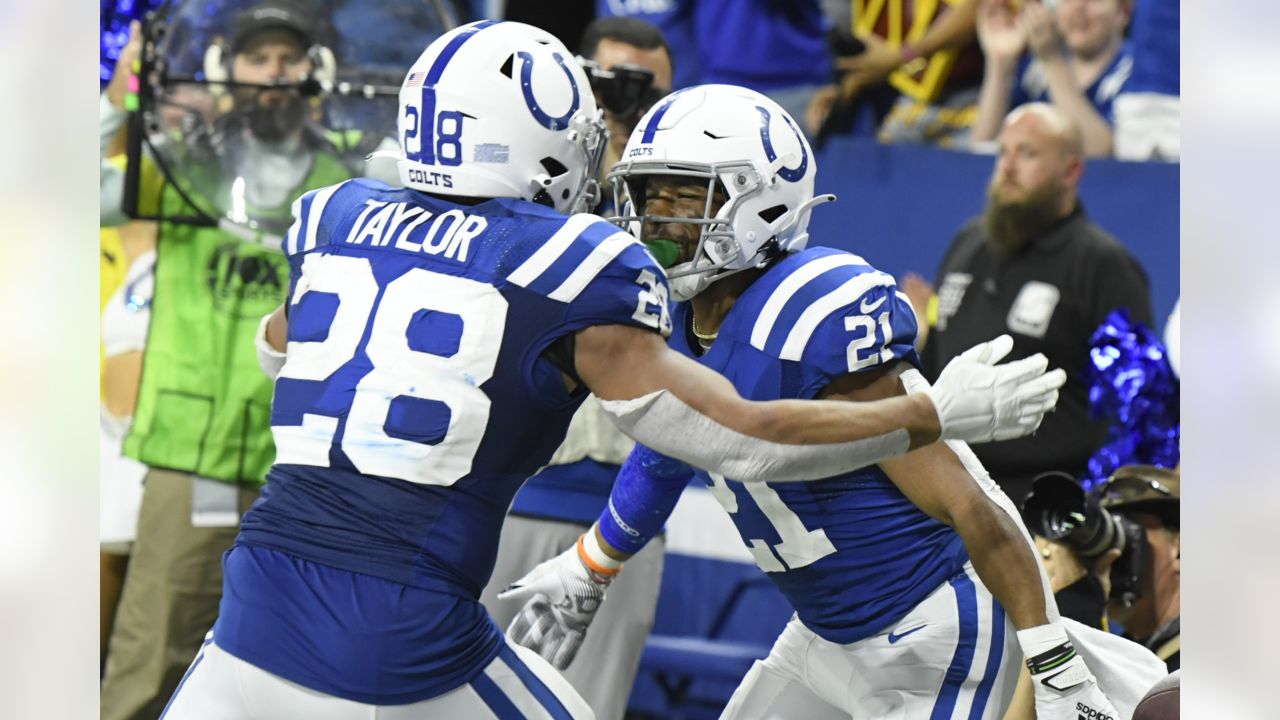 INDIANAPOLIS, IN - OCTOBER 30: Washington Commanders quarterback Taylor  Heinicke (4) scrambles out of the pocket during an NFL game between the  Washington Commanders and the Indianapolis Colts on October 30, 2022