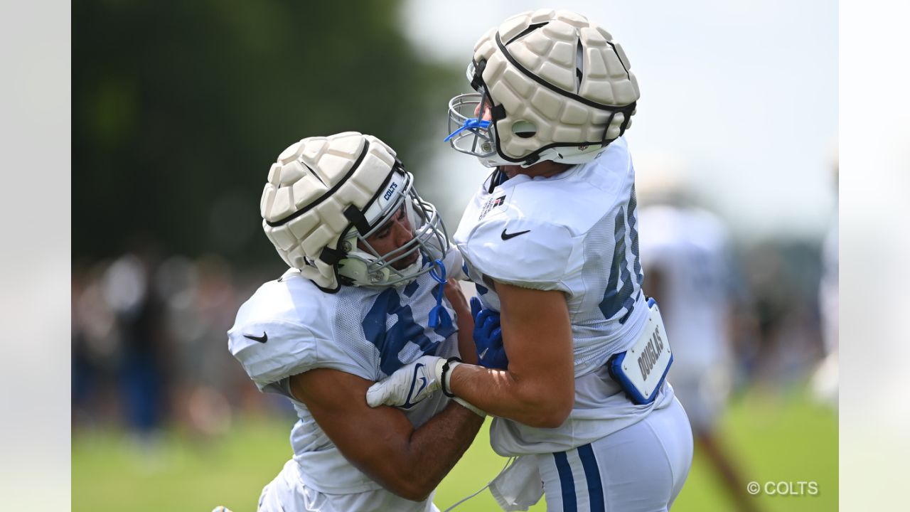 Indianapolis Colts cornerback Stephon Gilmore (5) and Indianapolis Colts  safety Nick Cross (20) talk on the field during an NFL football game  against the Tampa Bay Buccaneers, Saturday, Aug. 27, 2022, in