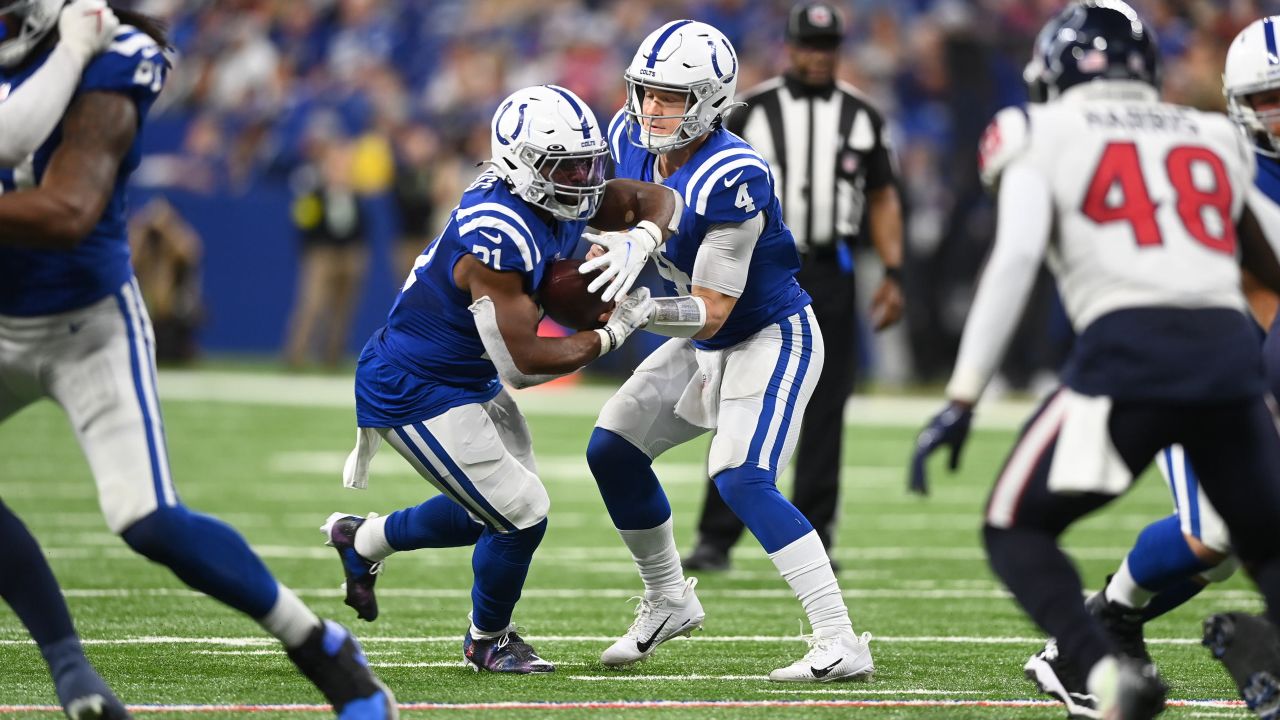 January 8, 2023, Indianapolis, Indiana, U.S: Indianapolis Colts safety  Rodney McLeod (26) fights off a tackle by Houston Texans quarterback Davis  Mills (10) after intercepting his pass during the game between the