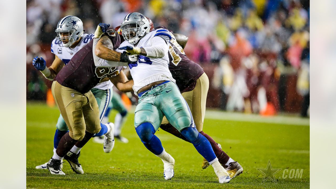 Las Vegas Raiders defensive tackle Maliek Collins (97) puts pressure on  Denver Broncos quarterb …