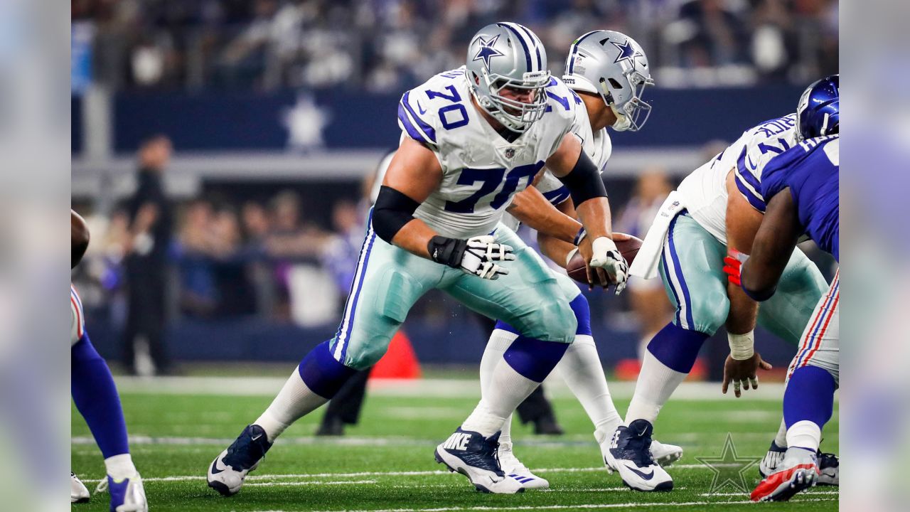 ARLINGTON, TX - DECEMBER 11: Dallas Cowboys Zack Martin (70) blocks during  the game featuring the