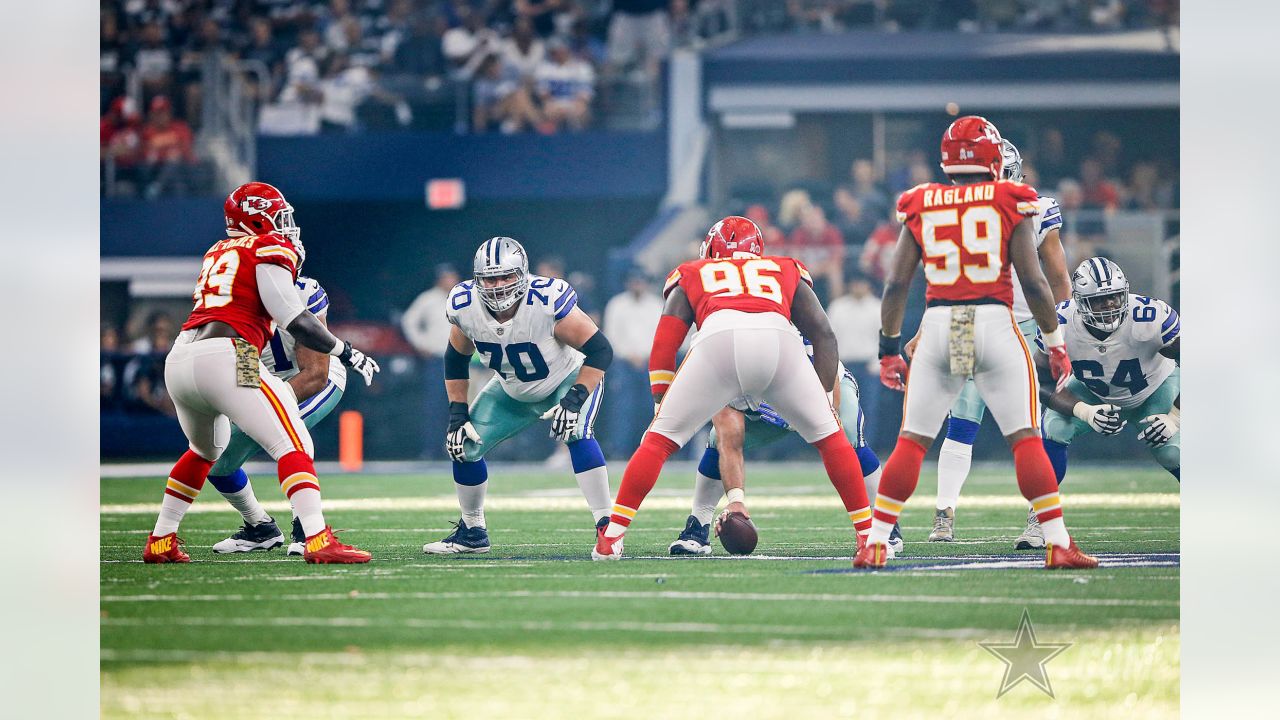 ARLINGTON, TX - DECEMBER 11: Dallas Cowboys Zack Martin (70) blocks during  the game featuring the