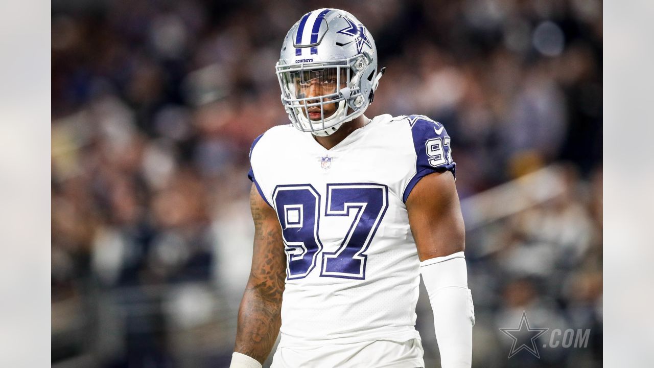 Dallas Cowboys defensive end Taco Charlton (97) walks off the