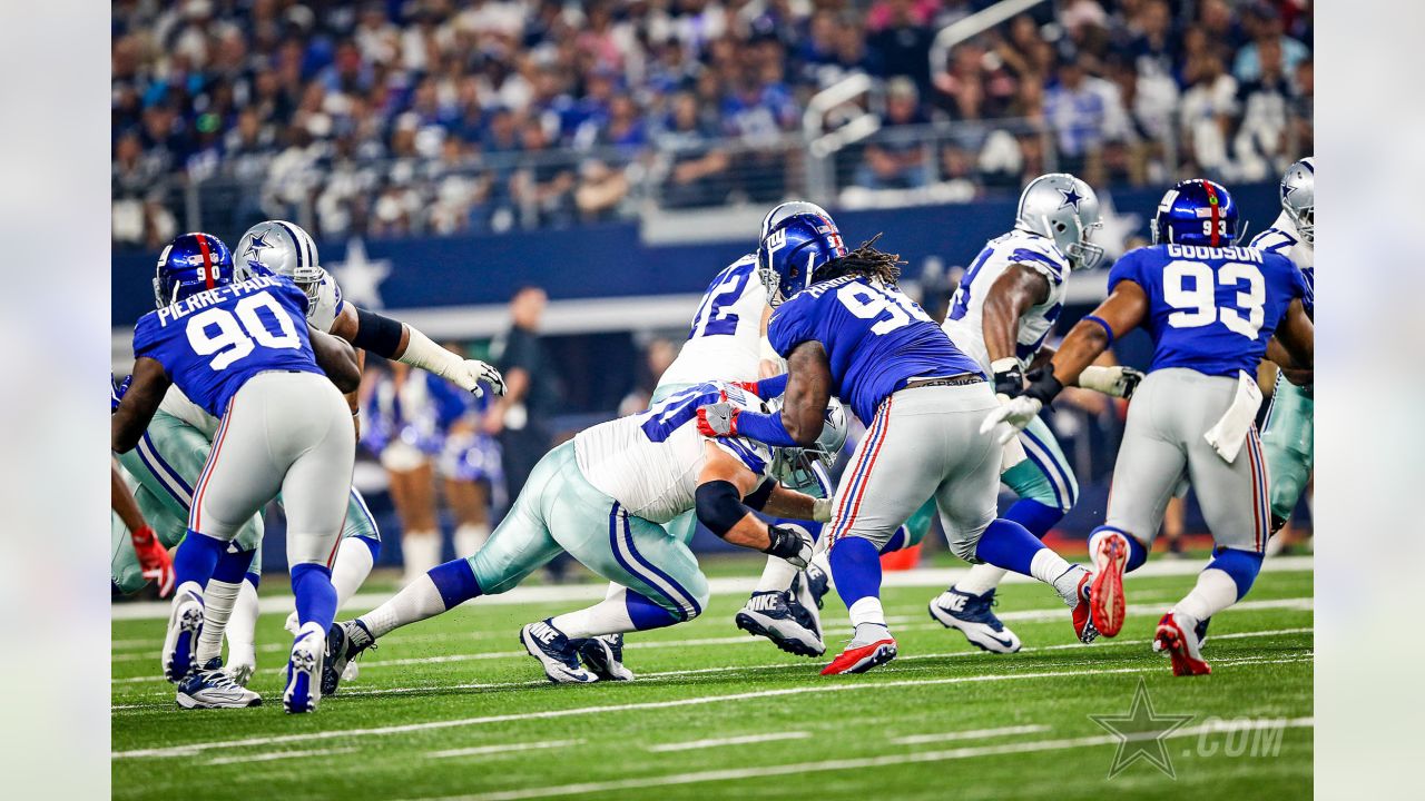 ARLINGTON, TX - DECEMBER 11: Dallas Cowboys Zack Martin (70) blocks during  the game featuring the