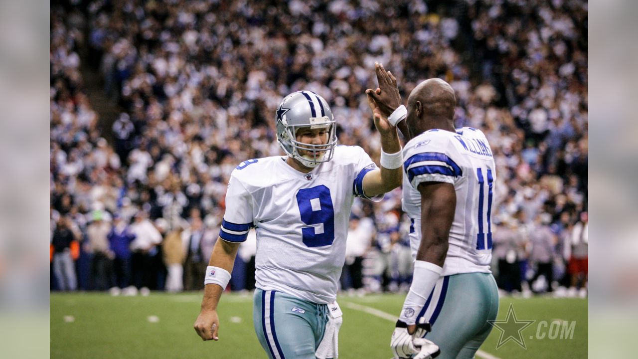 Dallas Cowboys wide receiver Terrell Owens (81) talks to quarterback Tony  Romo during the fourth quarter against the Washington Redskins at FedEx  Field in Landover, Maryland on November 16, 2008. The Cowboys