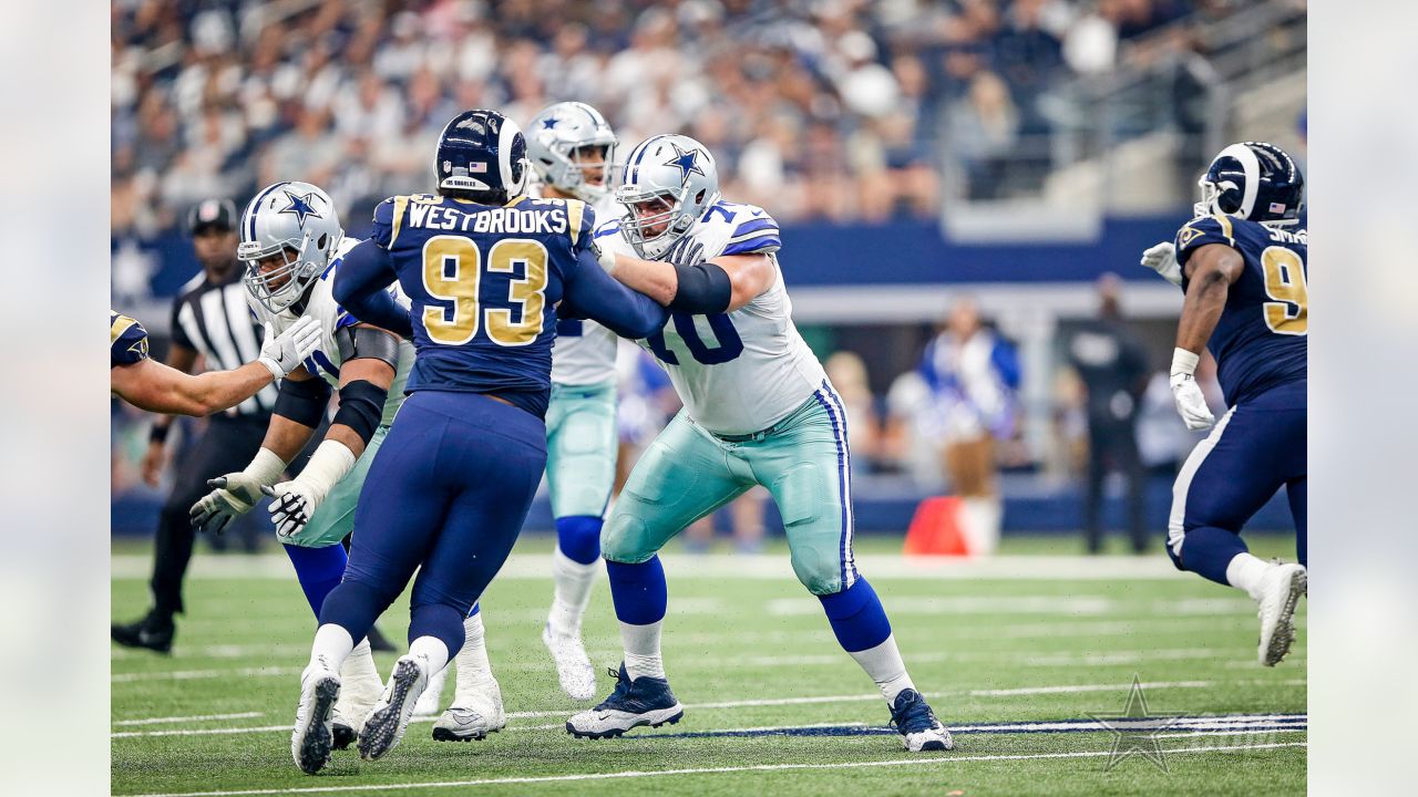 ARLINGTON, TX - DECEMBER 11: Dallas Cowboys Zack Martin (70) blocks during  the game featuring the