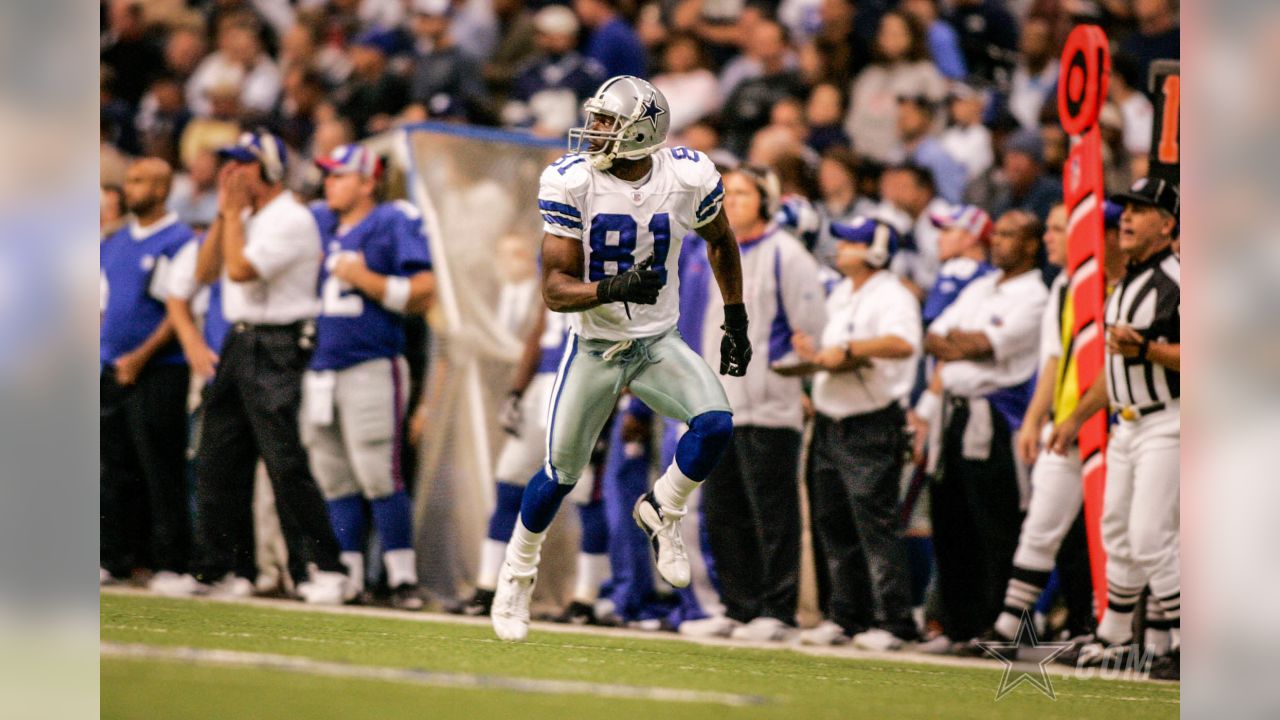 Philadelphia Eagles wide receiver Terrell Owens smiles at the fans