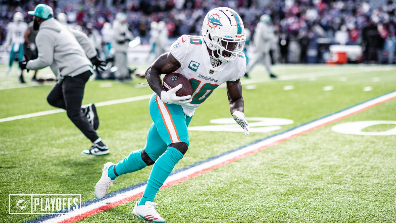 BUFFALO, USA, JANUARY 10, 2023: Miami Dolphins vs. Buffalo Bills. NFL Wild  Card Round 2023, Silhouette of NFL player of american football. holding bal  Stock Photo - Alamy