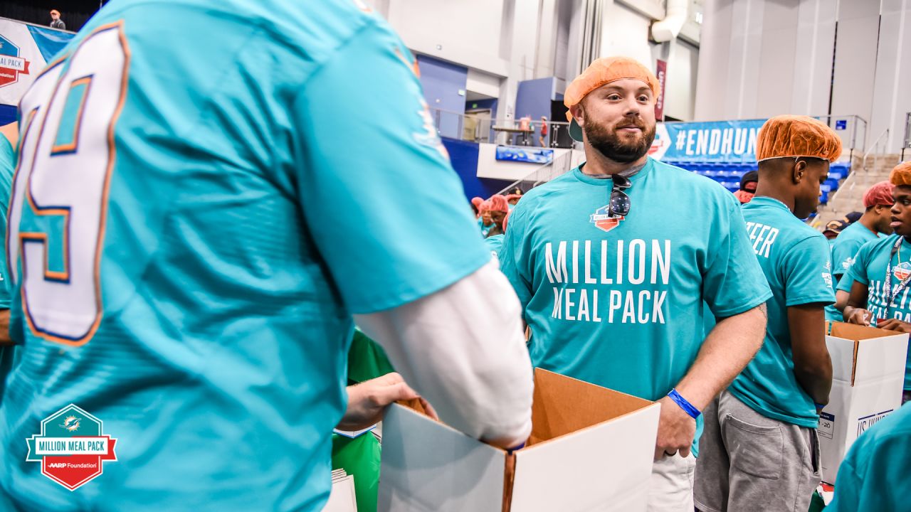 Miami Dolphins, AARP Foundation Host Fifth Annual Million Meal Pack on  NSU's Fort Lauderale /Davie Campus