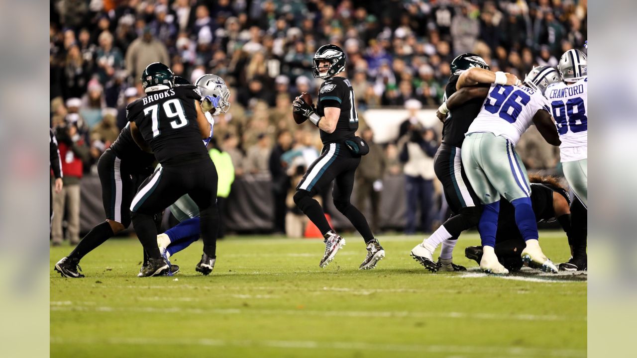 Philadelphia Eagles Nick Foles walks off the field following the Eagles  24-22 victory over the Dallas Cowboys at AT&T Stadium in Arlington, Texas  on December 29, 2013. With the win the Eagles