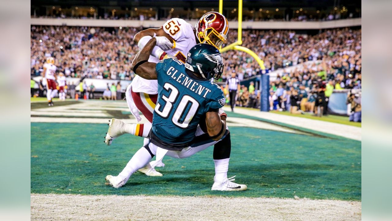 Philadelphia Eagles kicker David Akers gives his customary bow to the goal  posts after making the point after attempt after Philadelphia's first  touchdown during first quarter play in Philadelphia at Lincoln Financial