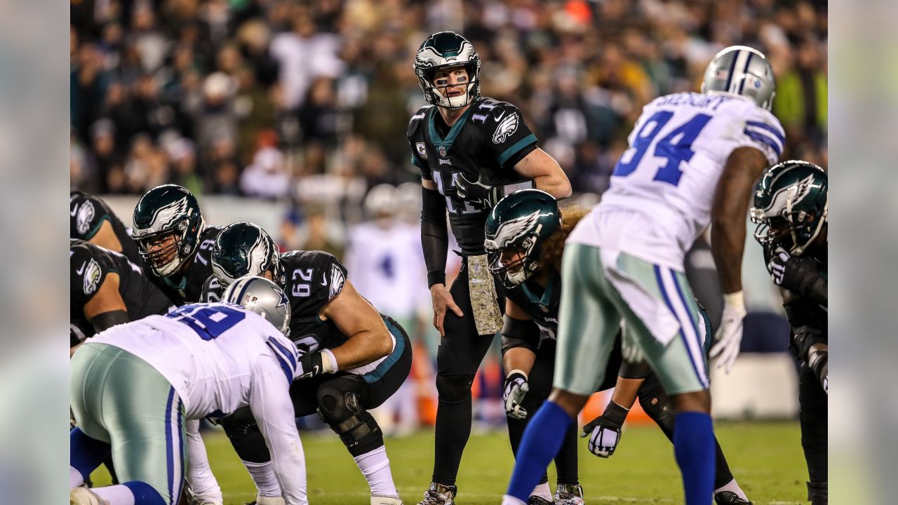 Philadelphia Eagles Nick Foles walks off the field following the Eagles  24-22 victory over the Dallas Cowboys at AT&T Stadium in Arlington, Texas  on December 29, 2013. With the win the Eagles