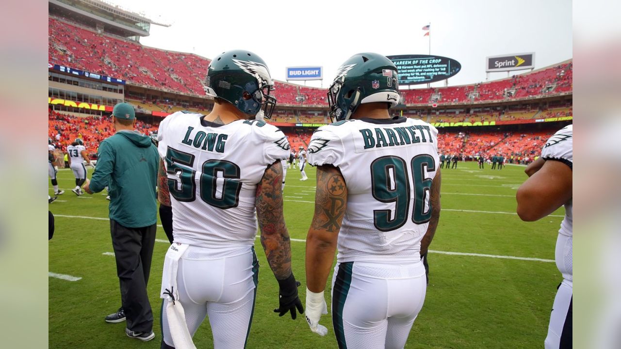 Philadelphia Eagles quarterback Carson Wentz (11) looks at the scoreboard  replay of a fumble his team returned for a touchdown in the fourth quarter  against the Washington Redskins at FedEx Field in