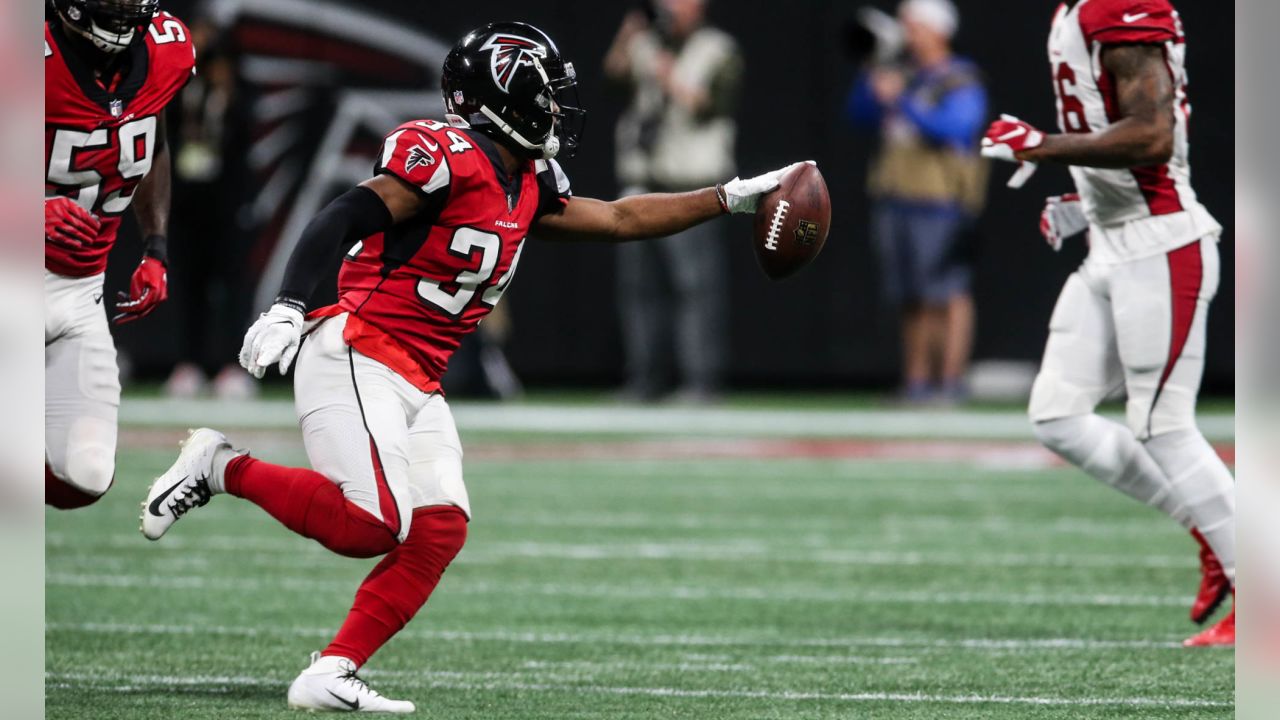 Atlanta Falcons wide receiver Justin Hardy (14) celebrates with Mohamed  Sanu (12) after his 5-yard touchdown pass over the Arizona Cardinals during  the second half of an NFL game at Mercedes-Benz Stadium