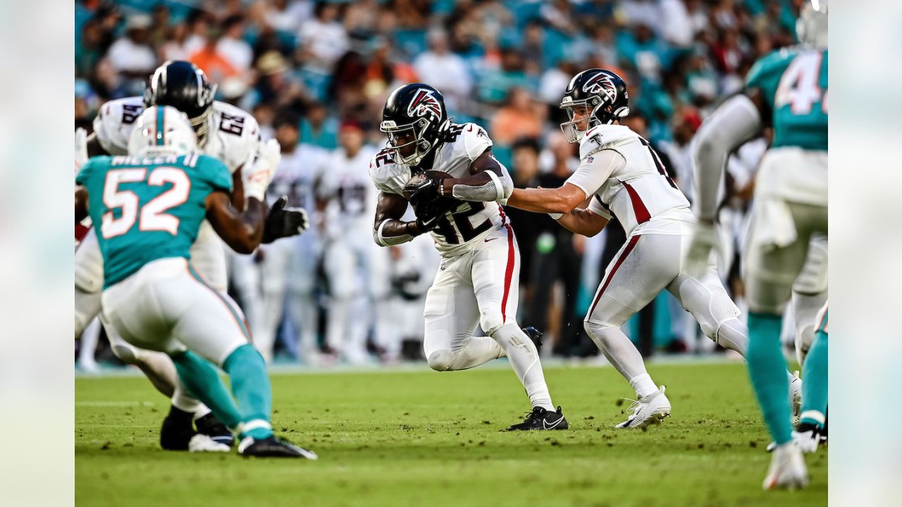 Atlanta Falcons quarterback Logan Woodside (11) works during the