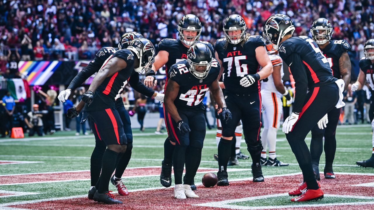 Atlanta Falcons running back Caleb Huntley (42) runs against the