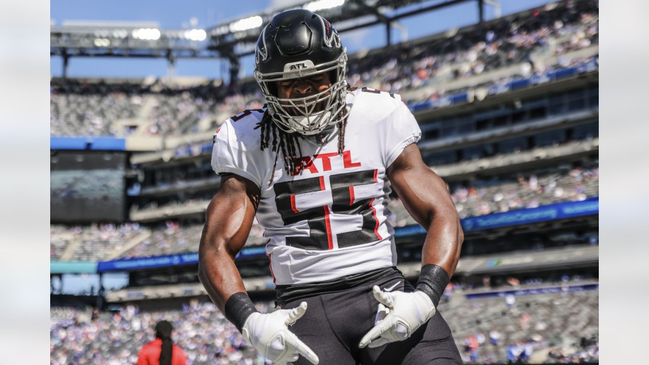 Atlanta Falcons defensive end Marlon Davidson (90) celebrates a touchdown  with outside linebacker Steven Means (55) during the first half of an NFL  football game against the Tampa Bay Buccaneers, Sunday, Dec.