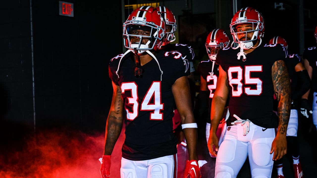 Atlanta Falcons running back Caleb Huntley (42) runs against the San  Francisco 49ers during the first half of an NFL football game, Sunday, Oct.  16, 2022, in Atlanta. (AP Photo/John Bazemore Stock