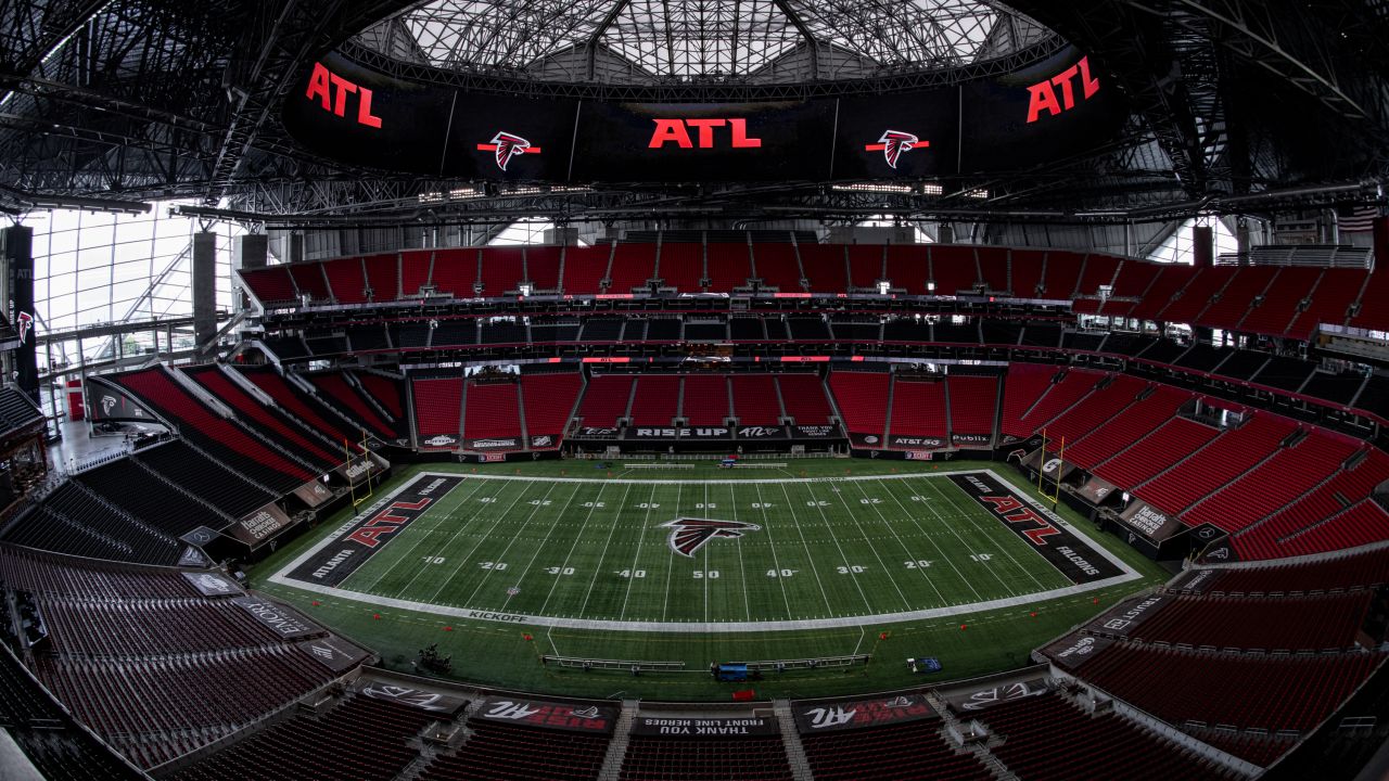 Rapper T.I. looks out from a suite during a tour of Mercedes-Benz Stadium,  the new stadium for the Atlanta Falcons NFL football team under  construction in Atlanta, Tuesday, April 25, 2017. (AP