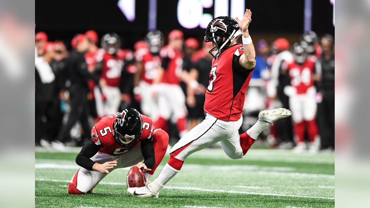 Atlanta Falcons wide receiver Justin Hardy (14) celebrates with Mohamed  Sanu (12) after his 5-yard touchdown pass over the Arizona Cardinals during  the second half of an NFL game at Mercedes-Benz Stadium