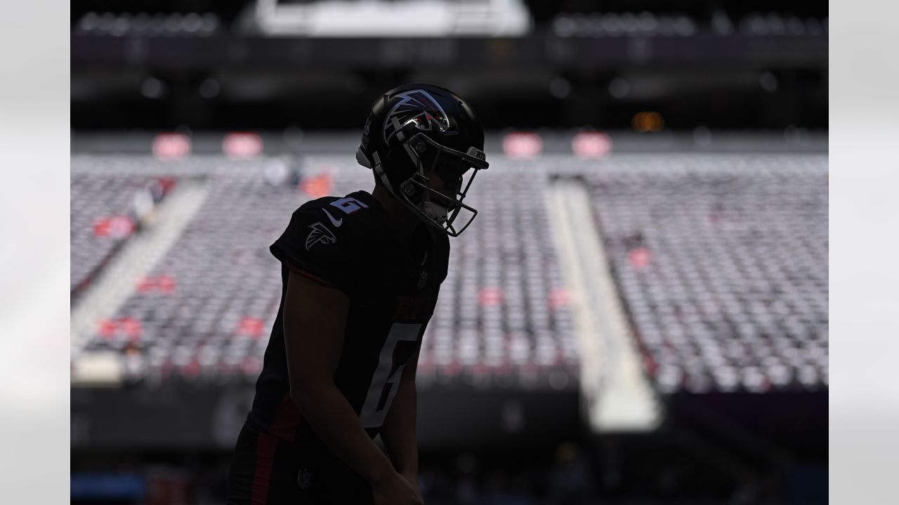 Atlanta Falcons kicker Younghoe Koo #7 looks on during pregame before the  game against the Los Angeles Charge…